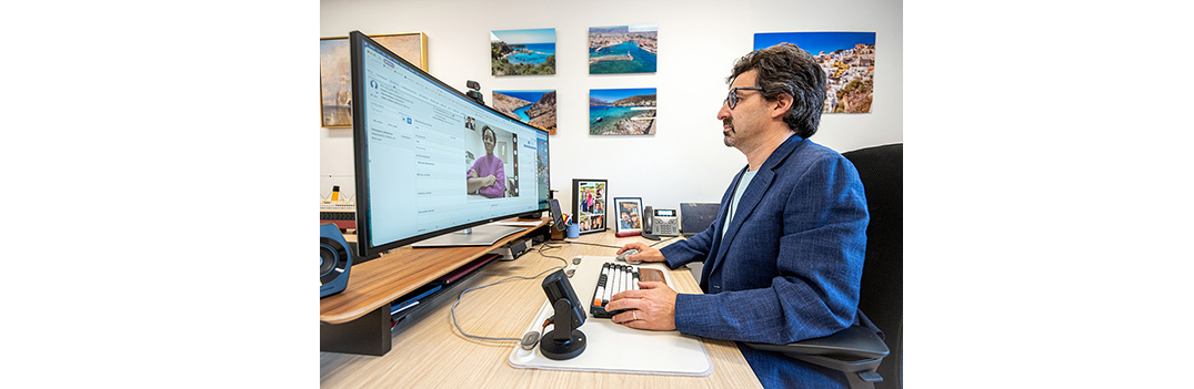 Dr. Joel Turner, Chief of the Department of Emergency Services at the JGH, holds a video conference with a patient in his department’s Virtual Urgent Care program.